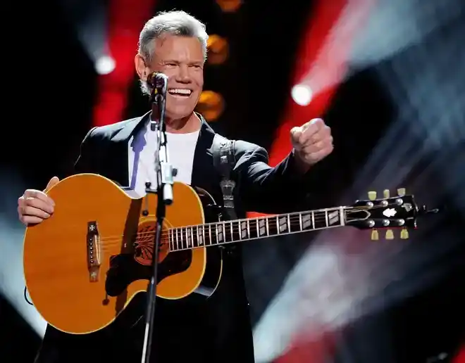 What country music is all about is Randy Travis, who is recognized for a great career despite health issues.