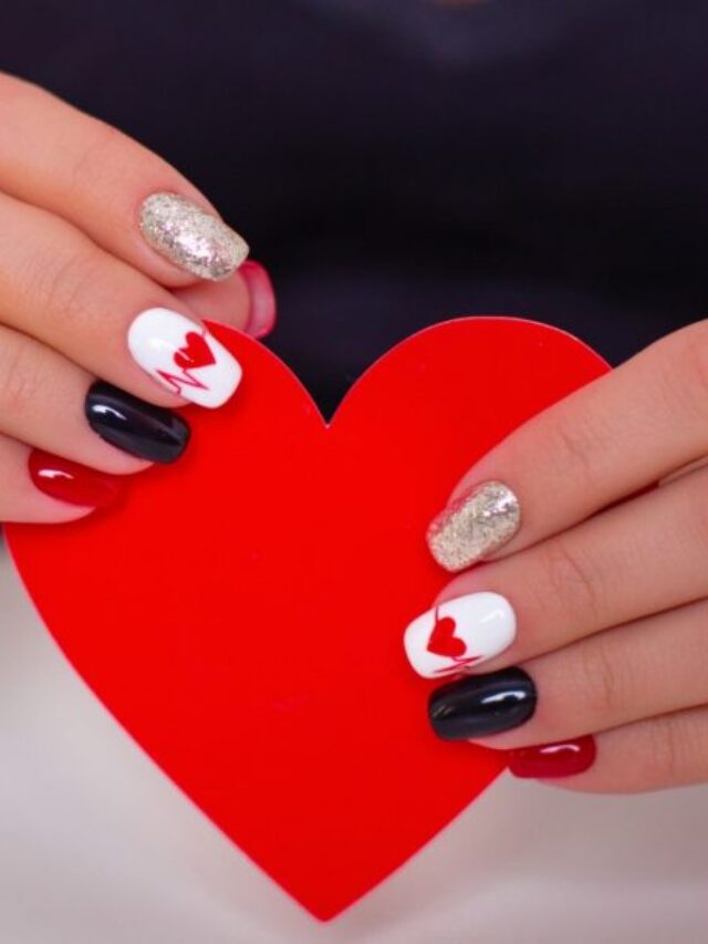 female-hands-with-romantic-manicure-nails-hearts-design-995x611-1